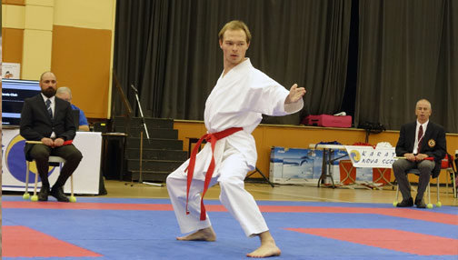 SMU karate student performsing a kata in a tournament 